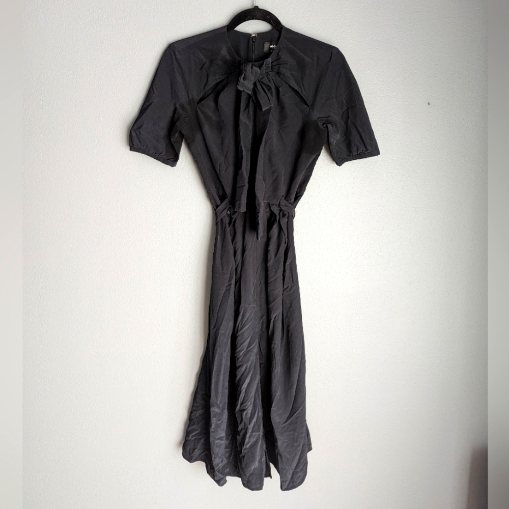 Rochas Paris Women's Black 100% silk Dress. Women's size 38. Designer dress.